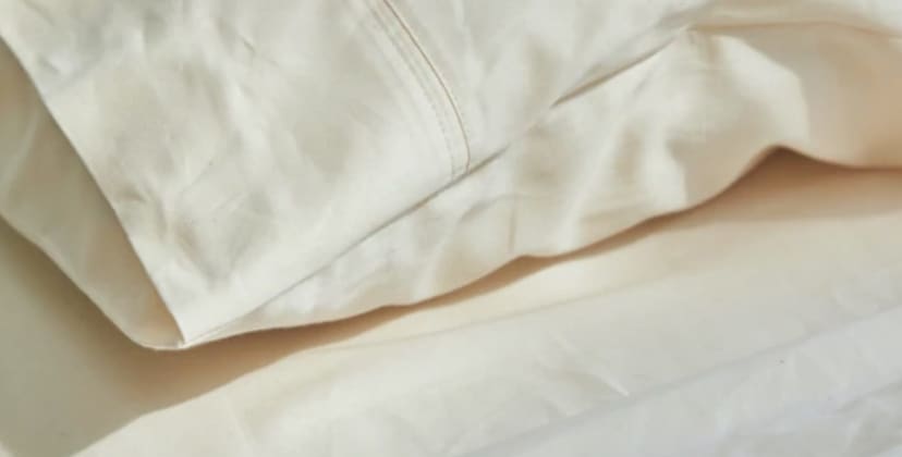 Product page photo of the Avocado Deep Pocket Organic Cotton Sheets